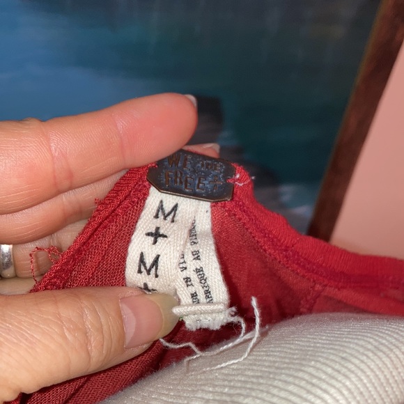 Red sheer-ish knit tunic with asym scraggly hem bohemian style deep scoop neck. - Picture 3 of 10